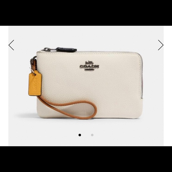 COACH Handbags - COACH DOUBLE CORNER ZIP WRISTLET IN COLORBLOCK